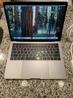2018 MacBook Pro 13-inch Retina Display Touch Bar 2.3ghz Quad Core Intel  i5 Sequoia macOS 8gb Ram 256gb Ssd With Charger Works Great 