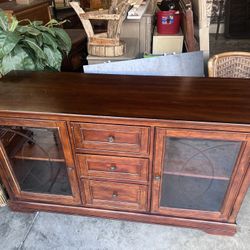 Sturdy wooden TV Stand with multiple drawers and shelves.  60”w x 20”d x 34”h 