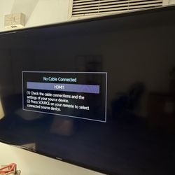 60" Flat Smart 4K UHD TV