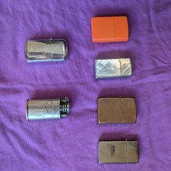 Vintage lighters, 4 Zippo, 2 Camel, All the strikers do work on these lighters