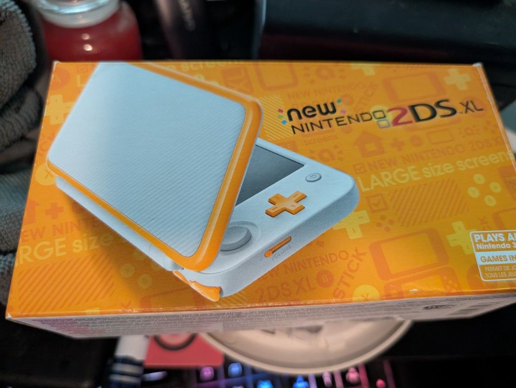 Nintendo 2DS XL loaded with games on a 64GB micro SD card
