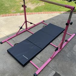 gymnastics bar and mat