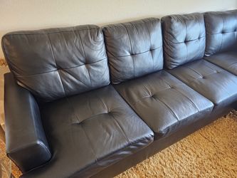 Selling an L-shaped sofa set.