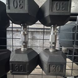 Two (2) 30 Lbs dumbbells (good used condition)