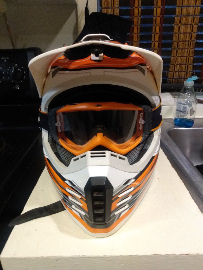 Helmet With Goggles And New Pair Of Gloves