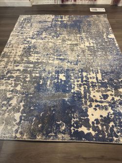 Abstract Blue and Ivory Area Rug