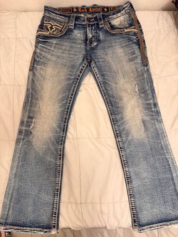Rock Revival jeans slim boot ( size 32)