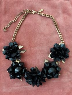 Gold fashion necklace with black abstract roses