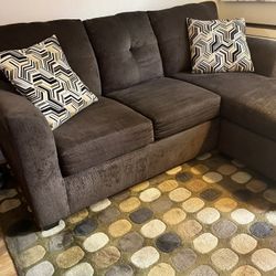 Sectional Sofa, 2 end tables and area rug will sell separately.