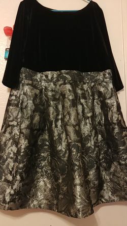 Beautiful sleeved velvet black dress glittery with flowers on the bottom
