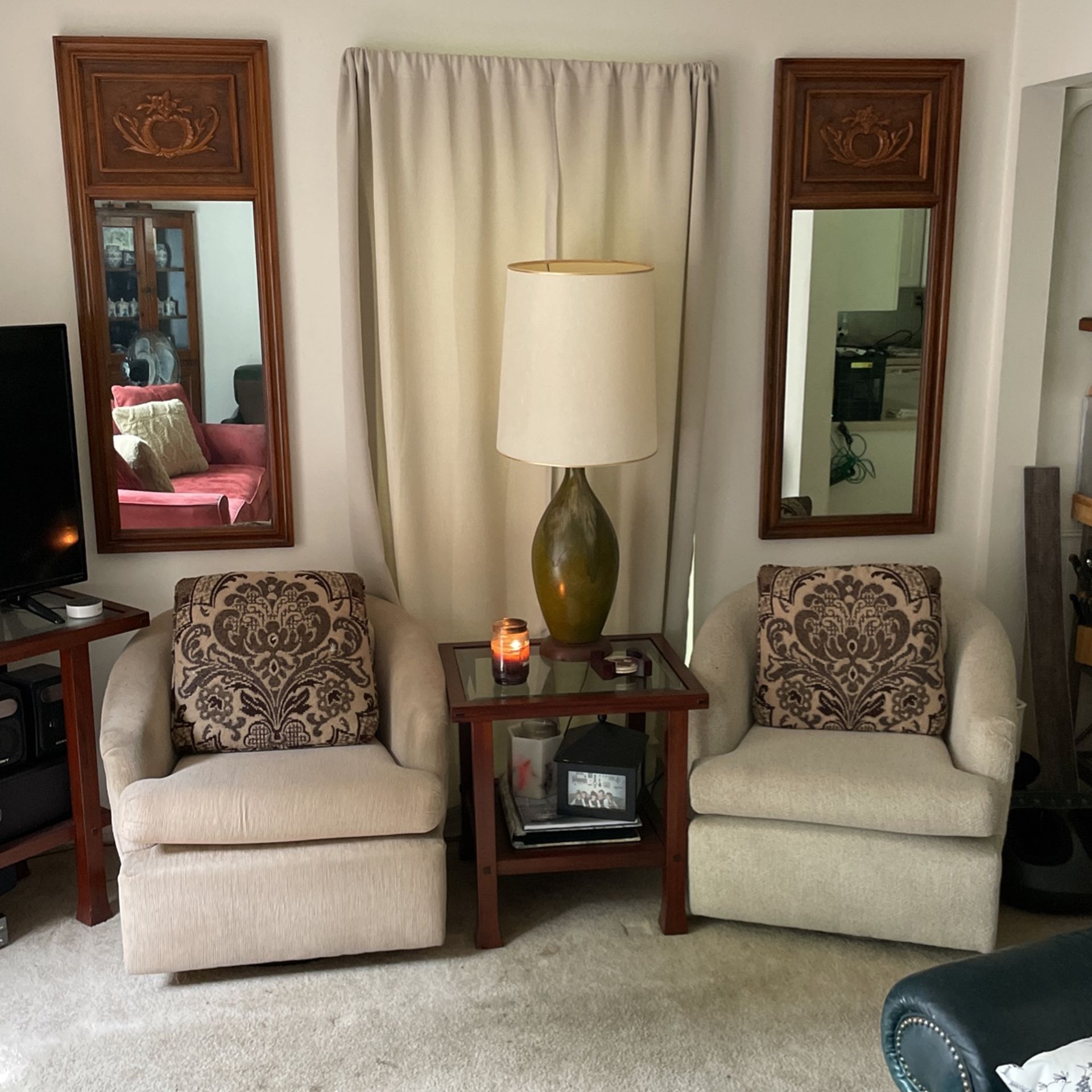 Two Swivel Chairs