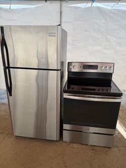 Frigidaire Refrigerator and GE Electric Range Set