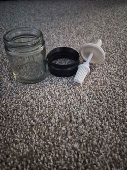 Bottle with silicone brush