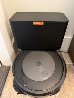 Title: iRobot Roomba Robot Vacuum with Self-Emptying Base