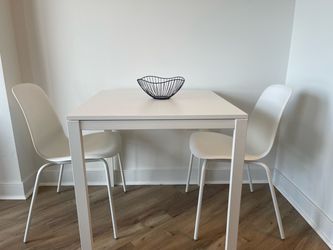 White Dining Table with chairs. Ikea Melltorp Table with Lidas chairs
