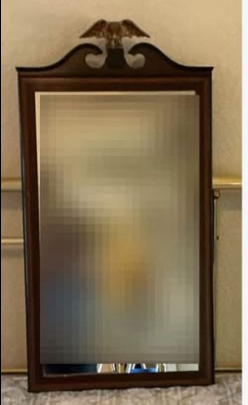 Federal Style Framed Mirror Mirror in a wood frame with an eagle on top. 18.5x31”