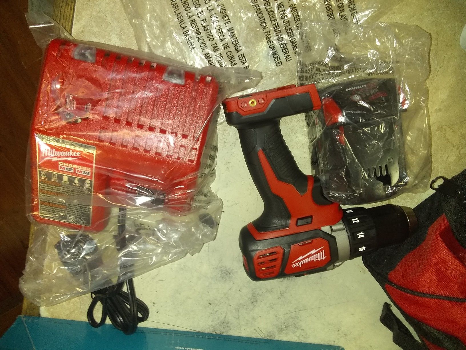 Milwaukee drill with charger and battery brand new