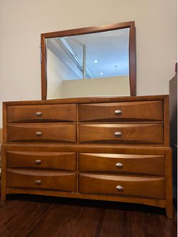 Dresser with a mirror