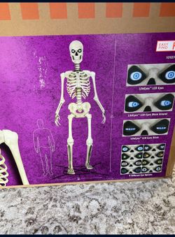 Home Accents Holiday 12 ft. Giant-Sized Skelly skeleton With Life Eyes LCDS halloween decoration