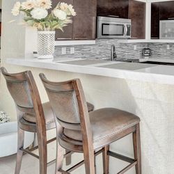 2 Counter-Height Leather Bar Stools – Used but in Good Condition