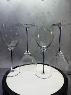 Set of (5) Gorgeous tall wine glasses with cobalt blue tear drop. Excellent Condition. Unknown manufacturer.  Two sets of five available.