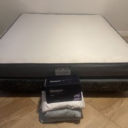 King Size Mattress/ Protective Cover/ Frame/ Box Spring/ Bed Spread/ & Brand New Sleepy’s Therapeutic Pillow (Still In The Box)