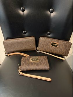 MK wallets/clutch
