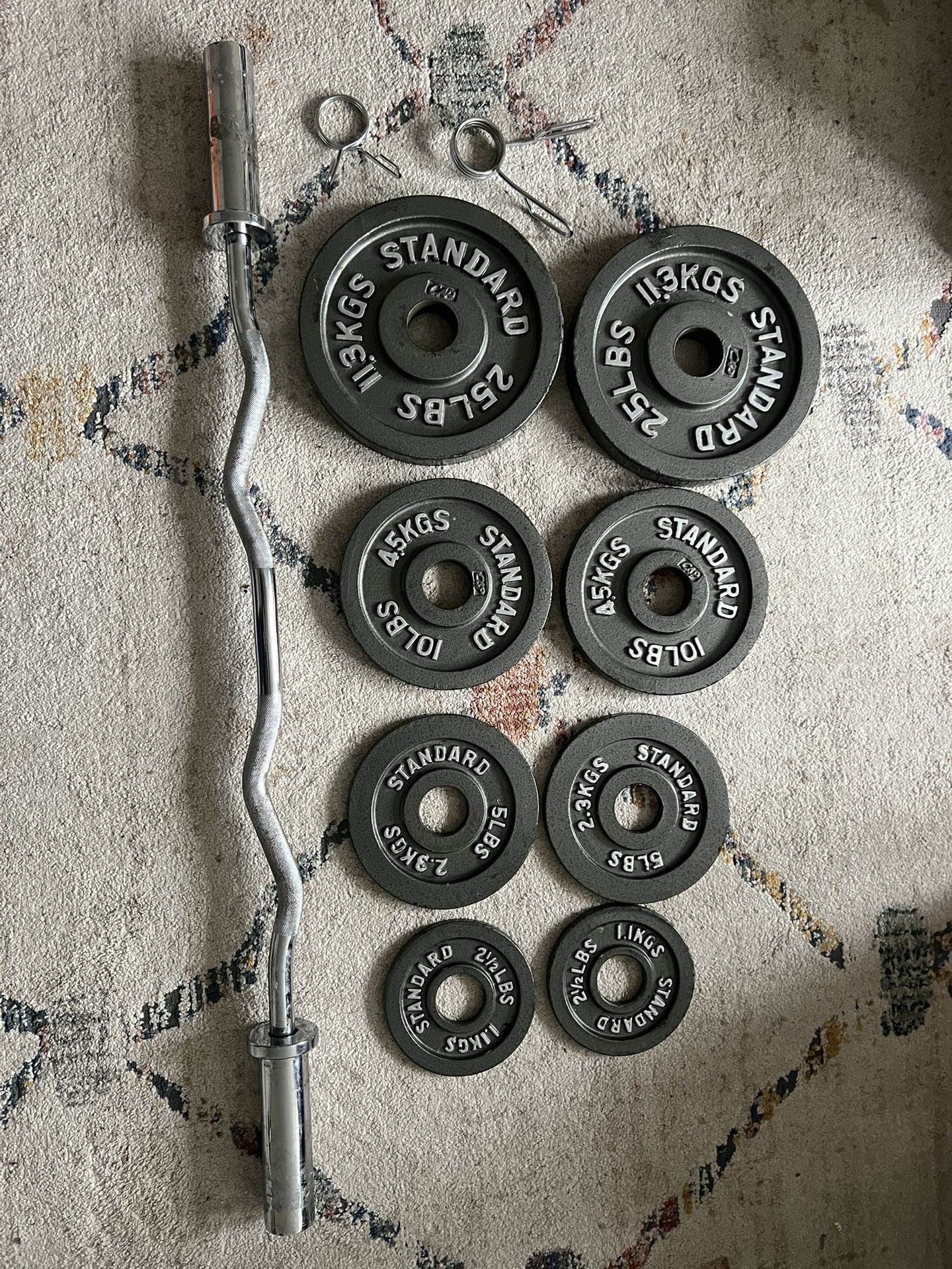 Olympic weight plates and barbell