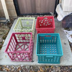 Four storage plastic baskets 15.75”x13,75”x11” $6 each