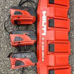 HILTI CHARGER AND BATTERYS ALL FULL CHARGE FOR $150 