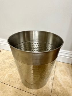 Silver trash can