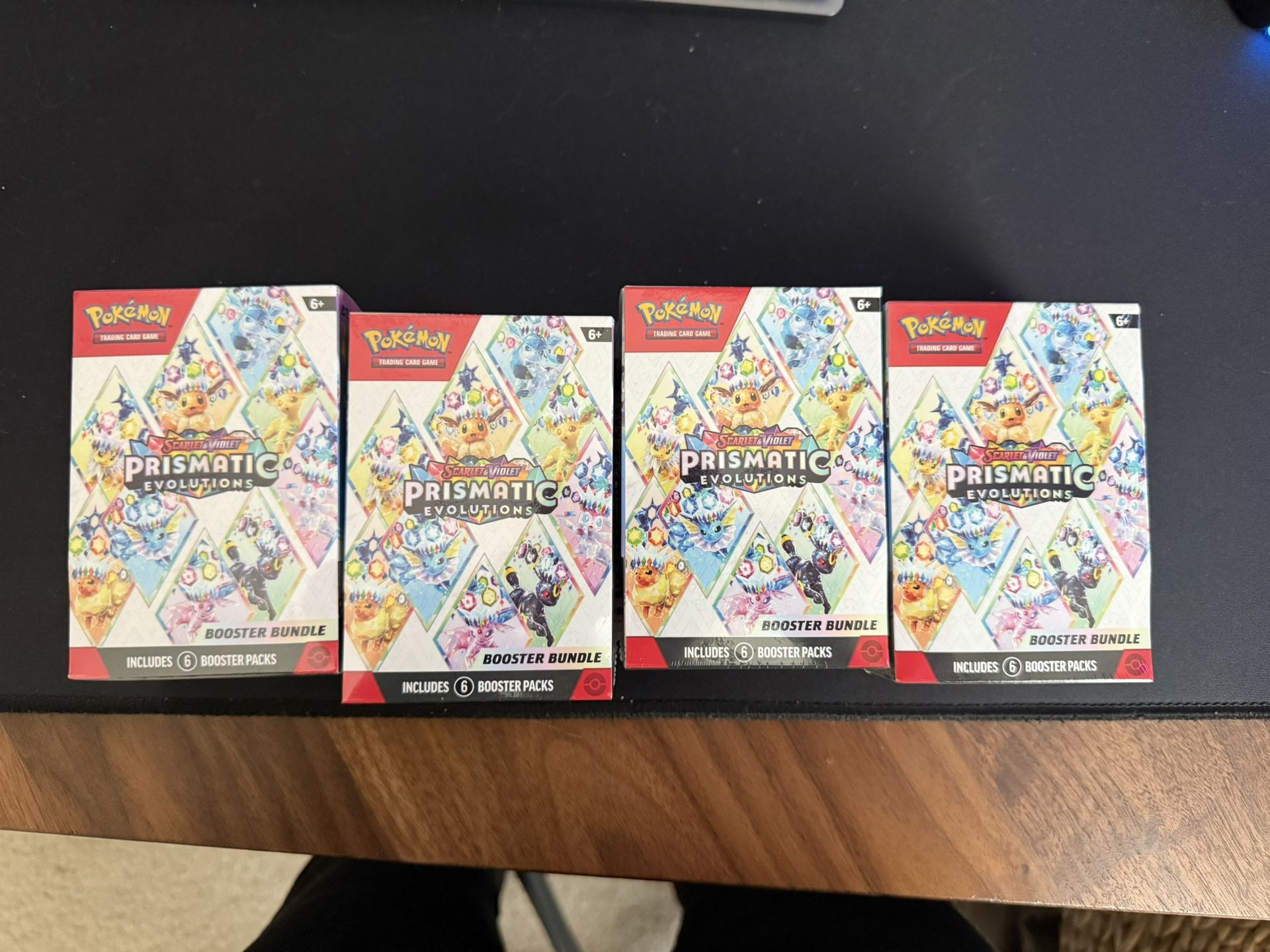 Pokémon Prismatic Evolution Booster Bundle X4