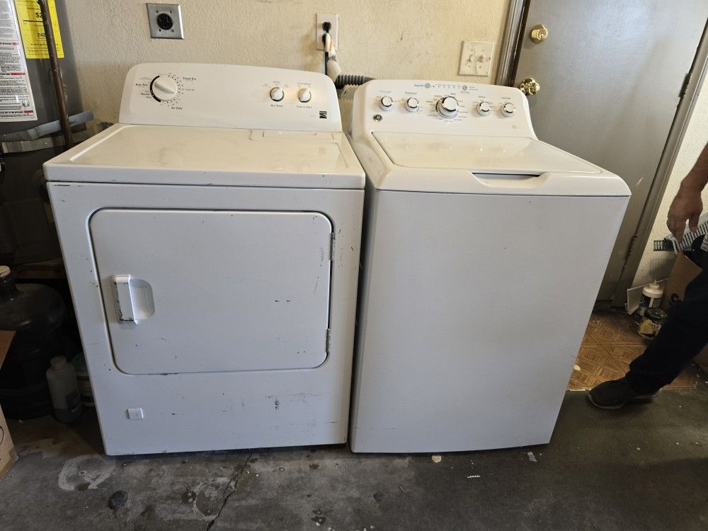 used GE top-load washer and a used Kenmore electric dryer.