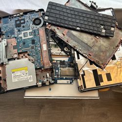Two Laptops Taken Apart And Can Be Put Back Together Minus The Screen On One.