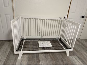 white baby crib