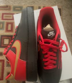 Brand new Red Black and Gold Nikes