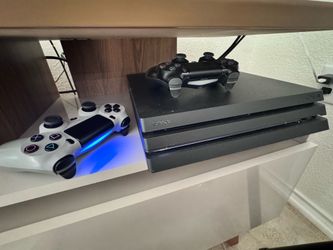 PS4 Pro 1TB Bundle – 2 Controllers + 5 Games – $250