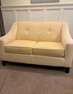 Yellow velvet loveseat