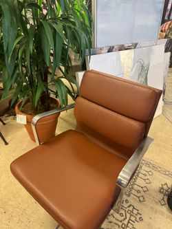 Brown Leather Lounge Chair with Chrome Arms