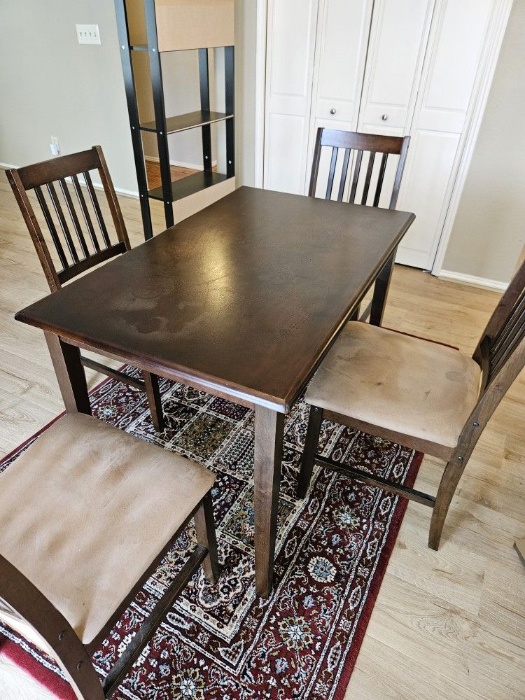 Used 10-Year-Old Wooden Dining Table with 4 Chairs