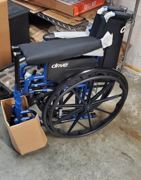 Drive Medical Wheel Chair With Armrests And Footrests
