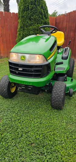 John Deere 125 20hp 42" cut.  Excellent running mower 526 hours Asking $1000.00/obo