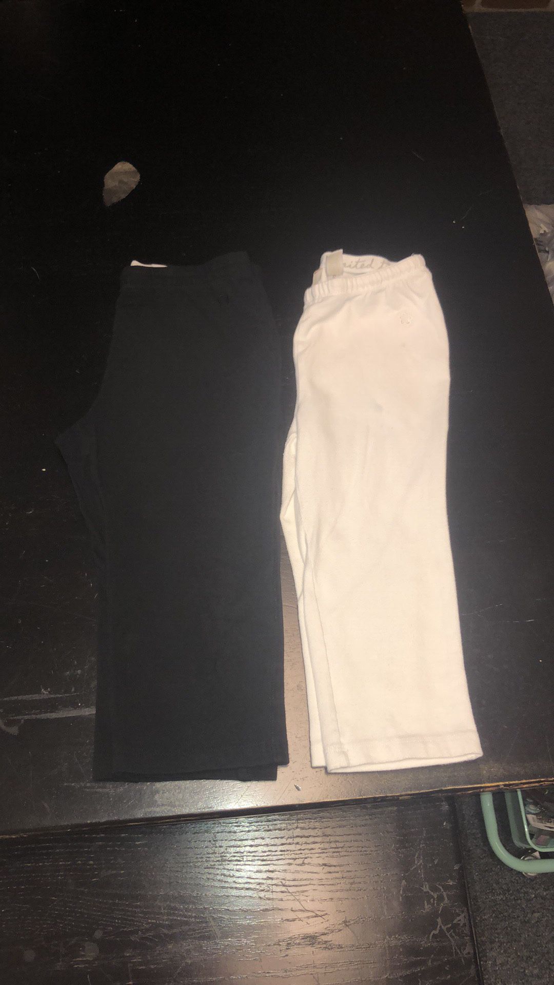 Kid’s size 14 Limited Too black & white capri leggings. The white ones have a few spots that may come out with bleach. I haven’t tried