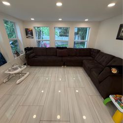 Large brown sectional couch