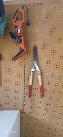 Hand Held Shrub Trimmer And Electric Trimmer