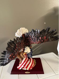 Montefiori Collection American Eagle Holding American flag