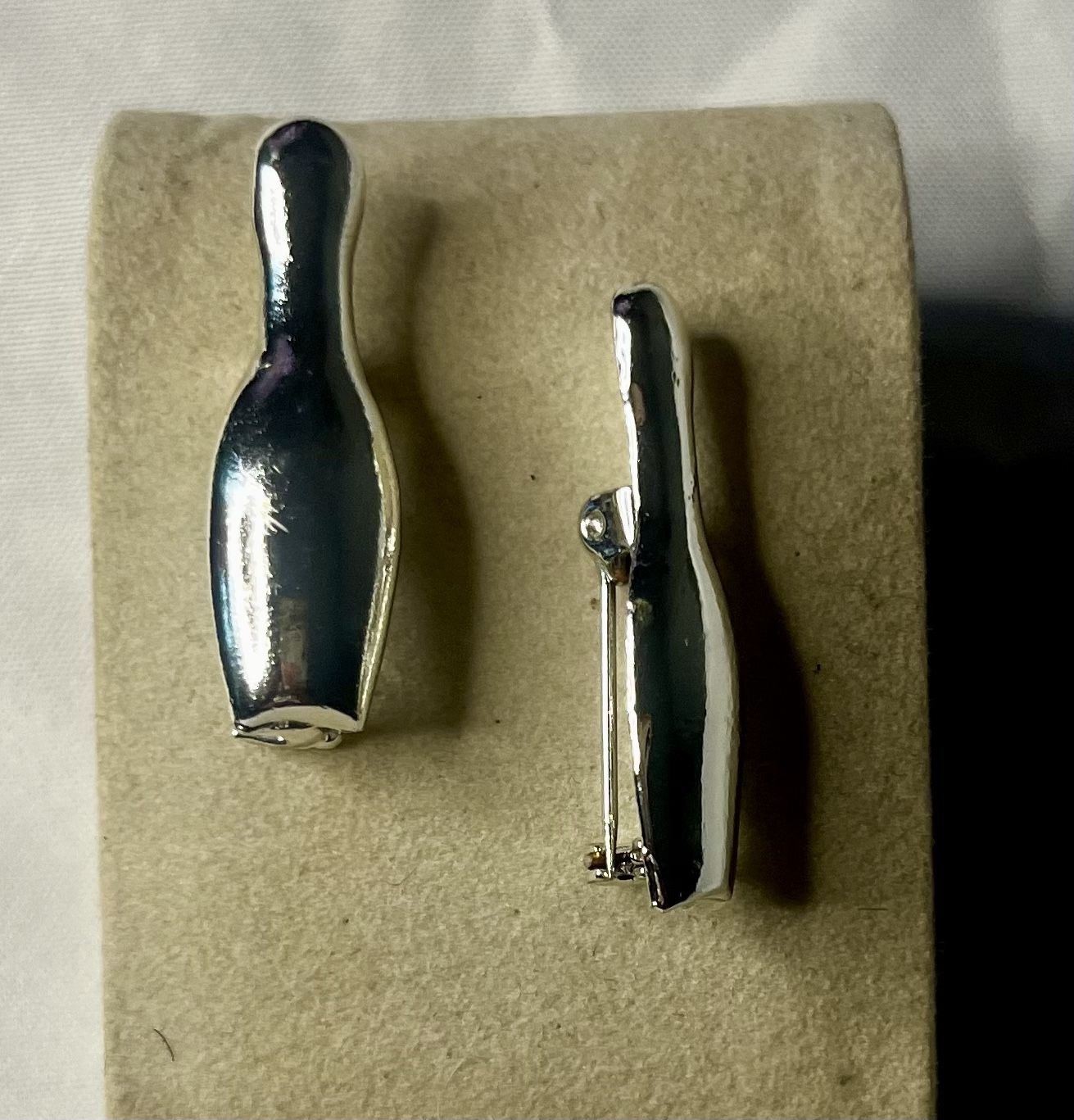 Vintage silver tone Bowling Pin Team brooches