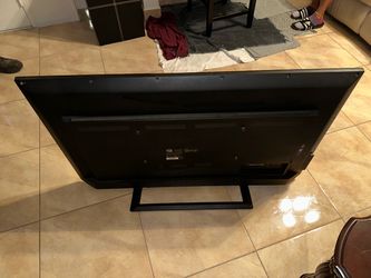 Flat Screen TV with Stand