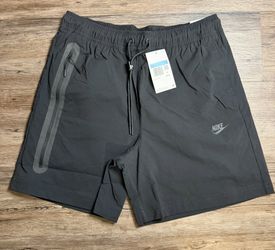 Nike tech woven shorts size M