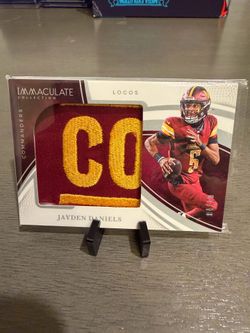 2025 Panini Immaculate-Jayden Daniels-Logos Patch (04/10)